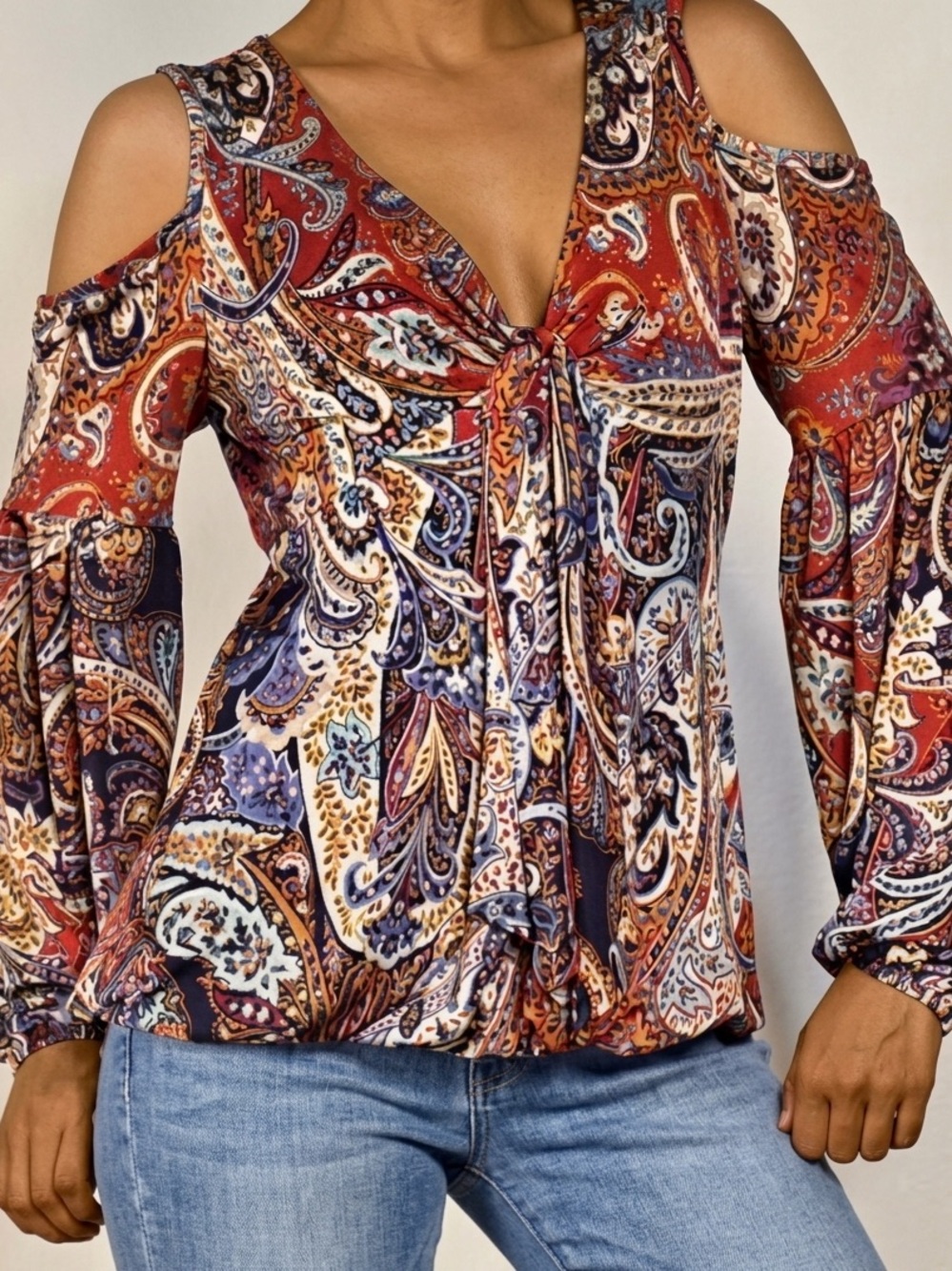 Venus Paisley.
Cold-Shoulder Twist-Front
Blouse in Rust Multi.